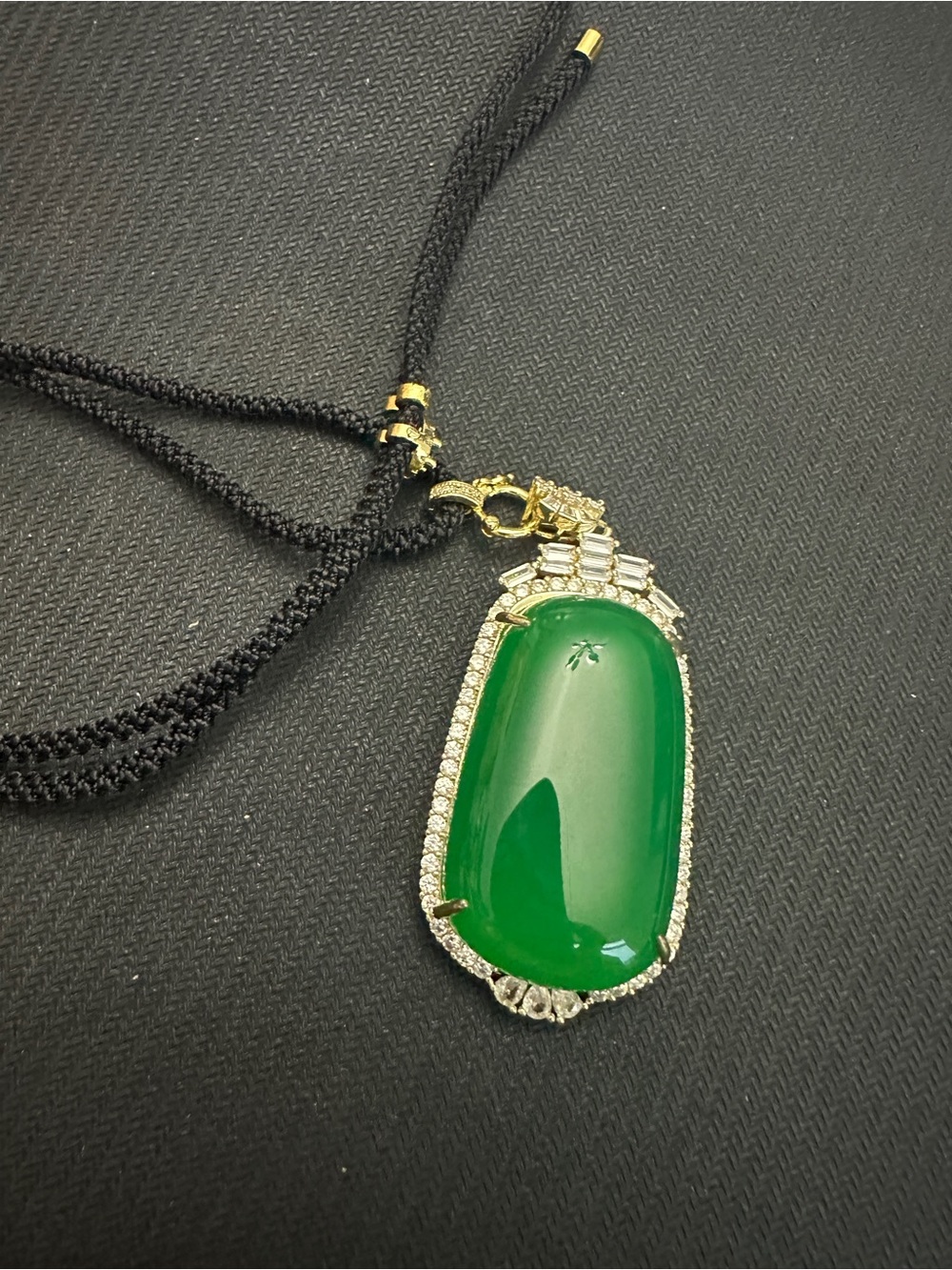 Elegant Green Jade Pendant Necklace with Gold Accents